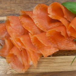 Salmon trout filet in slices, cold-smoked