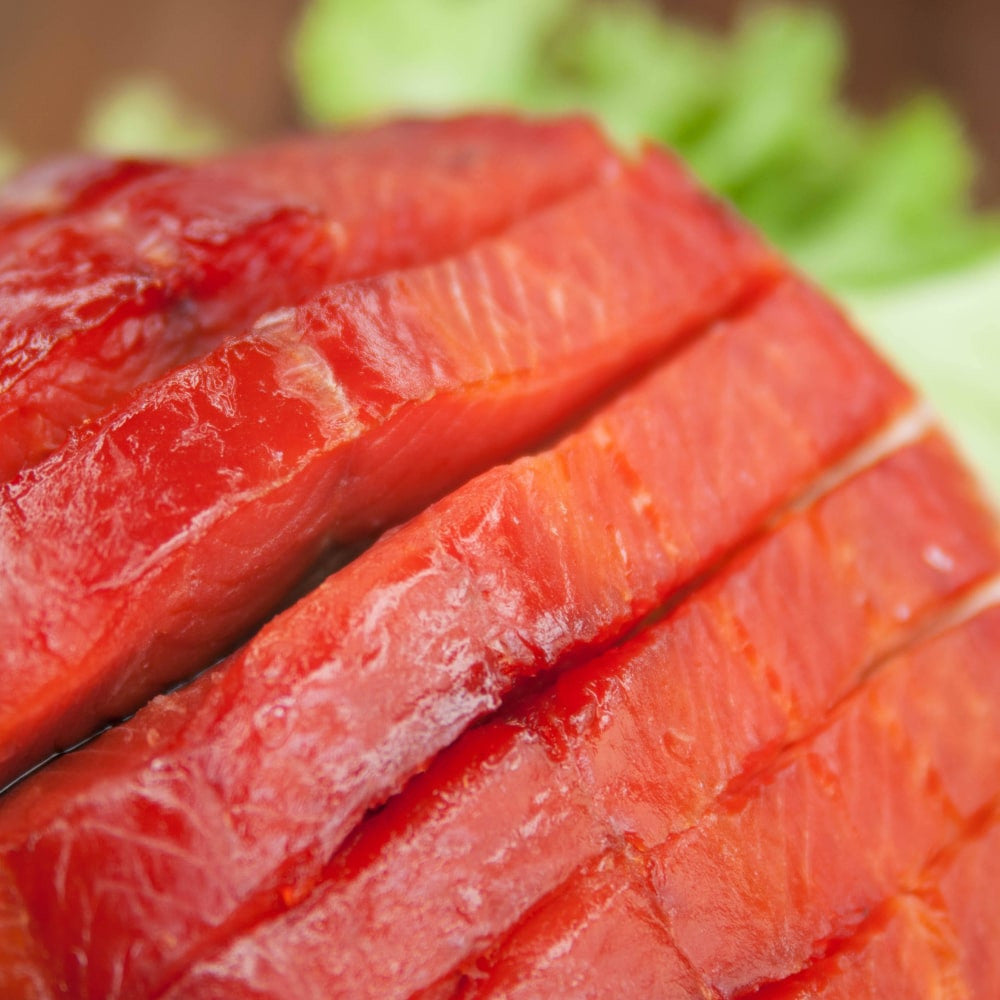 Rotlachsfilet gedörrt Wildfang – detailaufnahme rote Scheiben